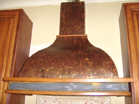 Venetian Plaster and rusted iron on Hood